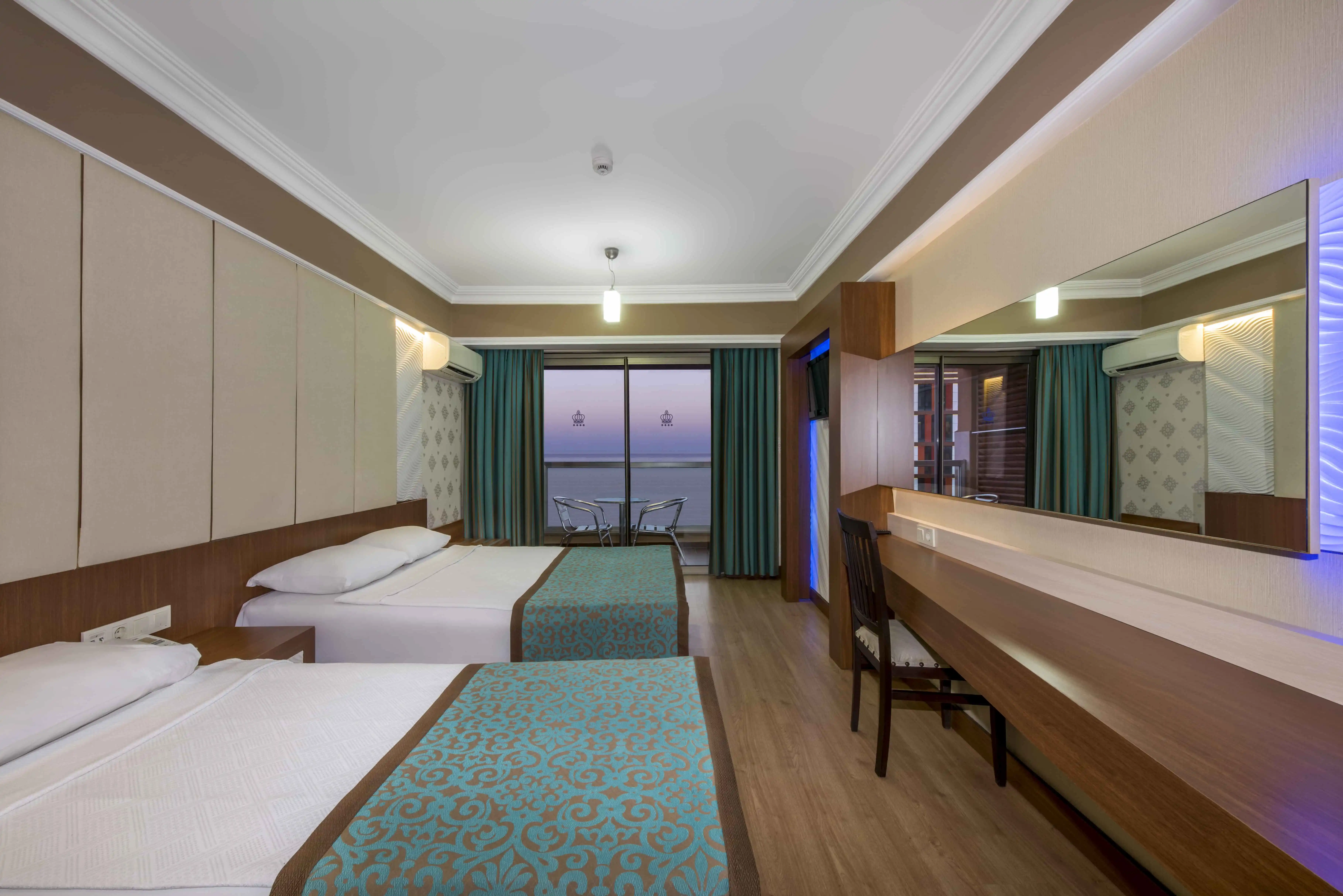 https://www.tacpremierhotels.com/rooms/galery/1742821961_standard-room-5.webp
